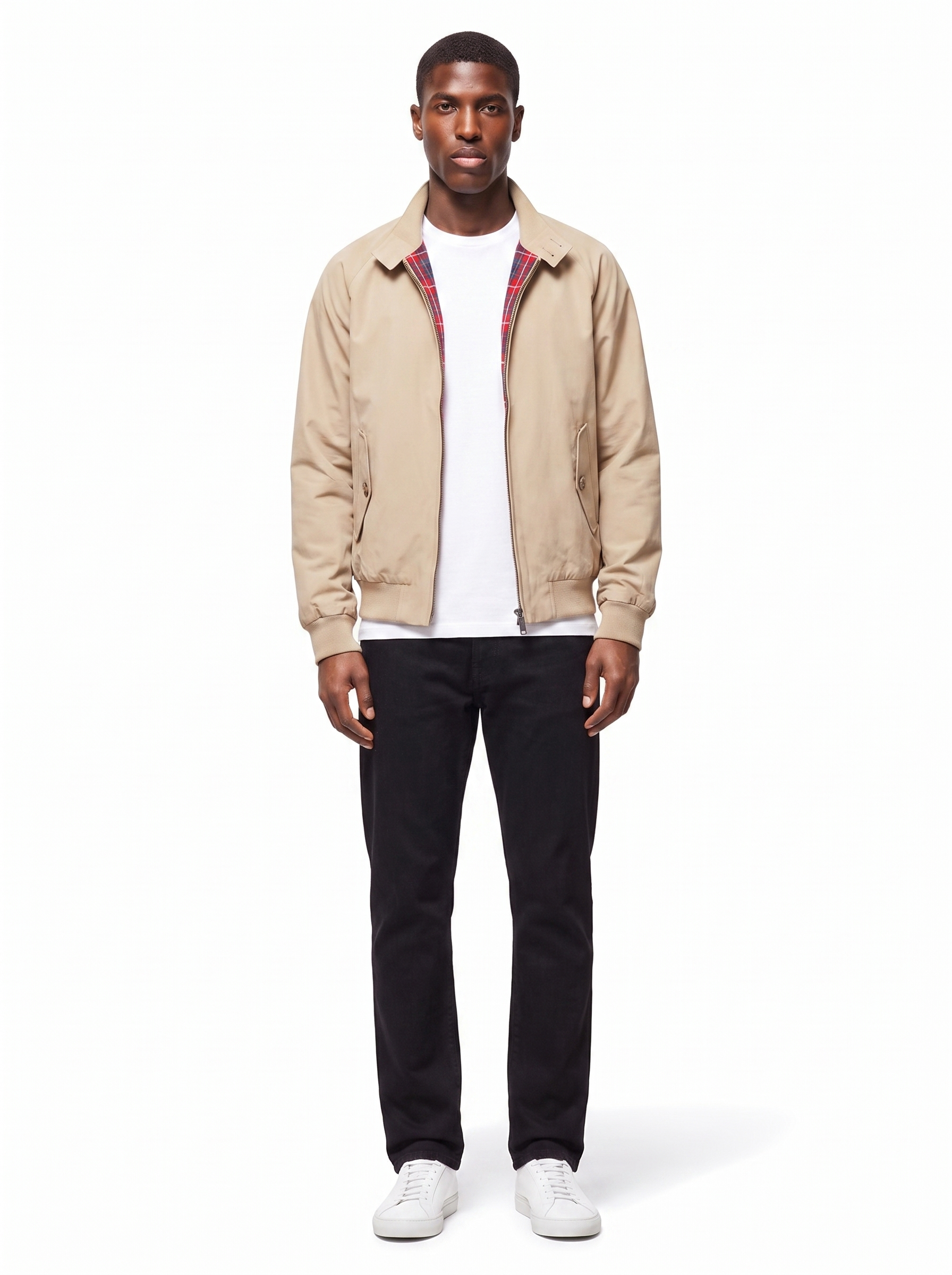 Beige harrington jacket with plaid lining worn by model, front view