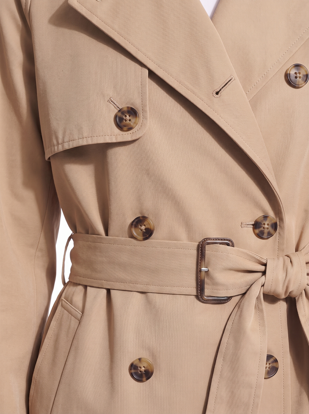 Trench coat buttons and belt close up detail