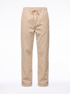 Beige corduroy pants product shot on white background