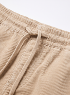 Drawstring waistband and corduroy wale close up detail