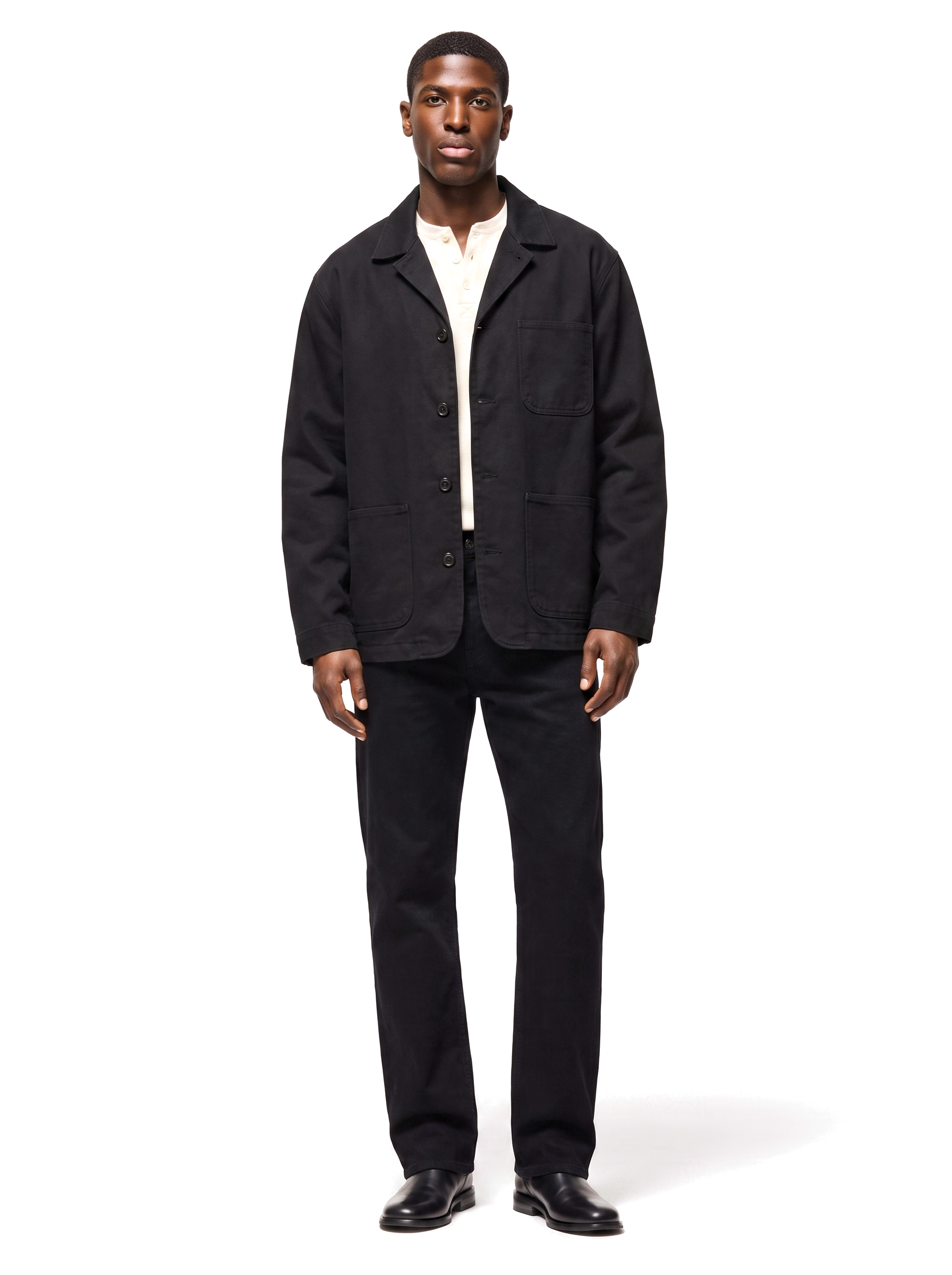 Black canvas chore jacket worn by model, front view