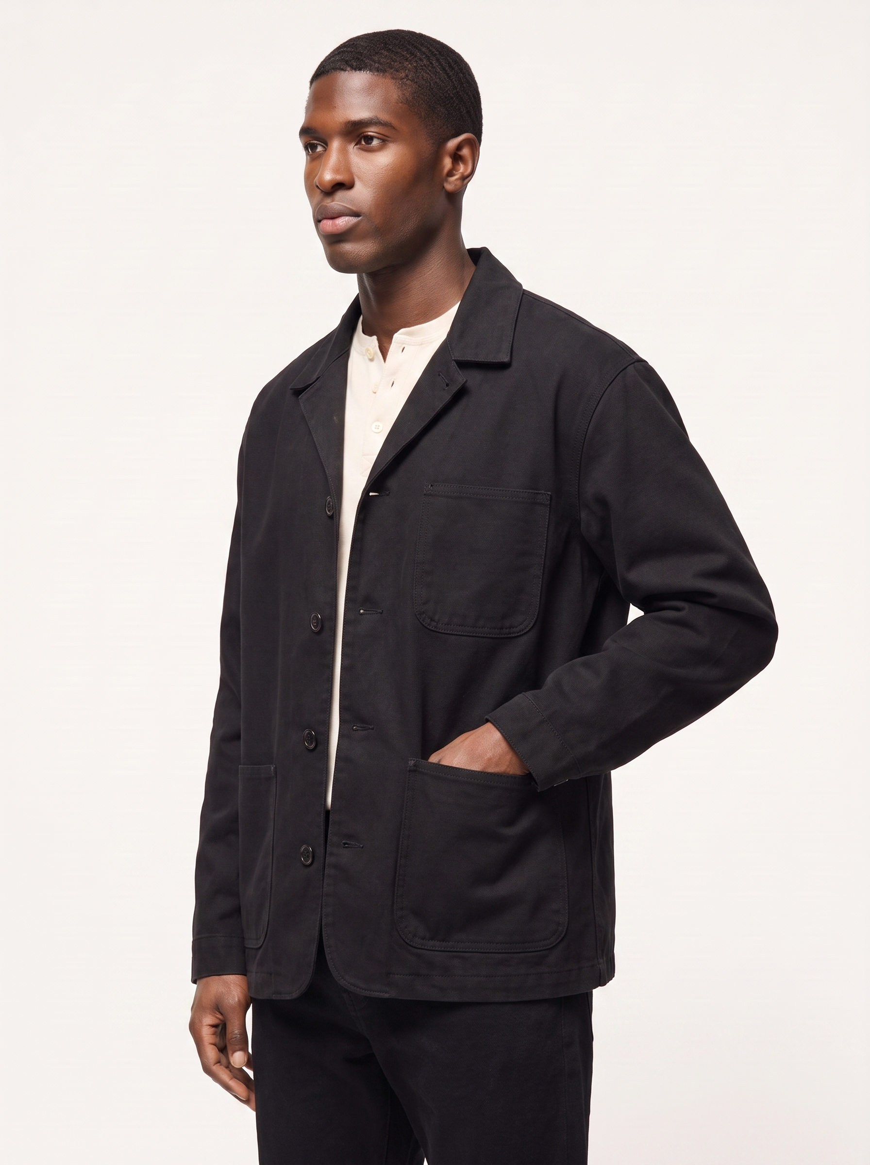 Black chore jacket boxy fit three quarter view