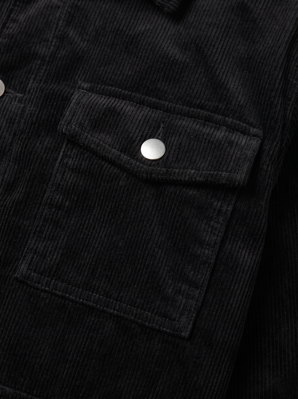 Close up of flap pocket and corduroy wale texture