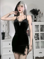 Black cross mini dress with spaghetti straps and high waist slit, worn by model