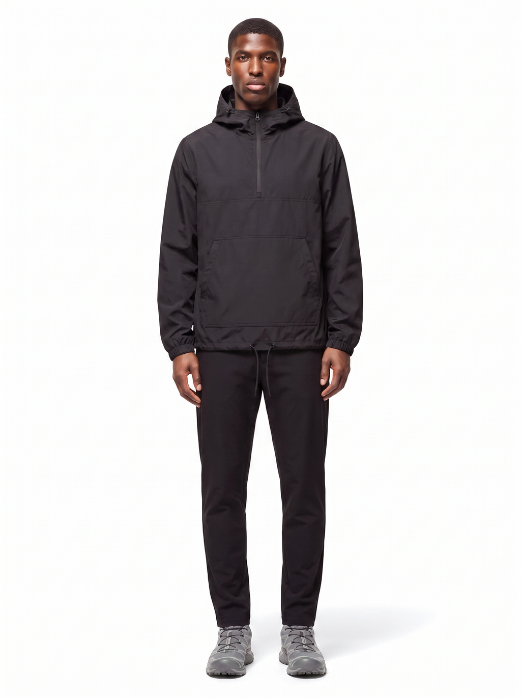 Black half zip hooded anorak, front view on model