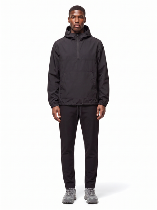 Black half zip hooded anorak, front view on model