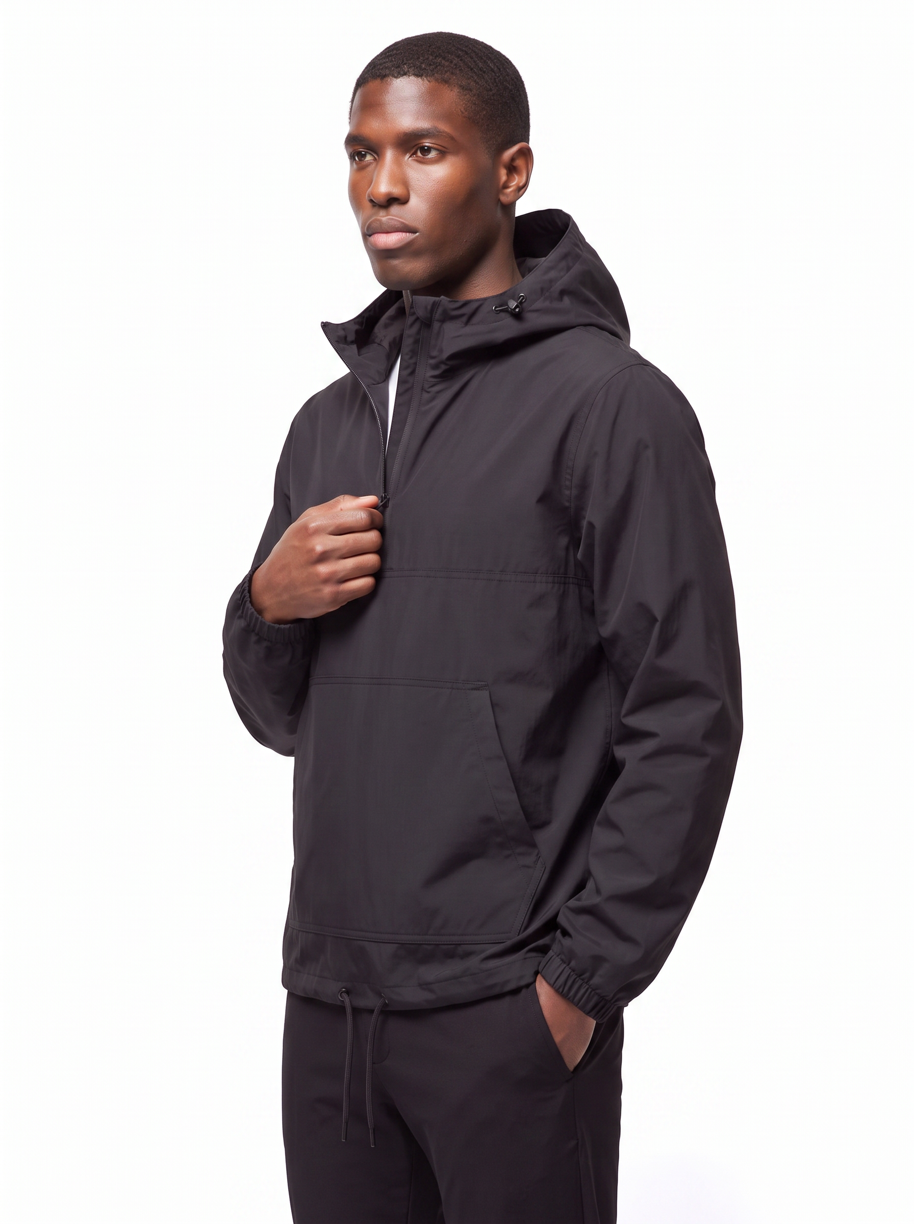 Black anorak three quarter view showing relaxed fit