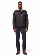 Black waxed canvas jacket with sherpa collar, front view on model