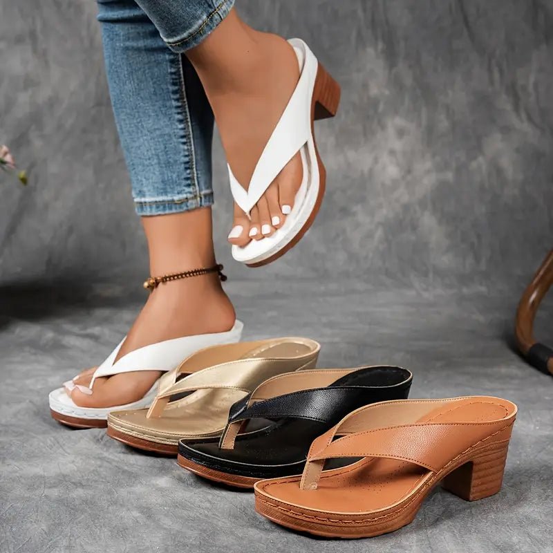 Block heel sandals shown as a pair