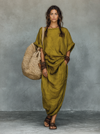 Side view of the maxi dress showing its relaxed silhouette