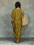 Full-length view of the maxi dress styled with sandals