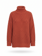 Oversized honeycomb knit turtleneck sweater product shot on white background