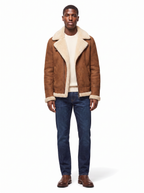 Brown suede-look aviator jacket with cream fleece collar, worn by model, full length