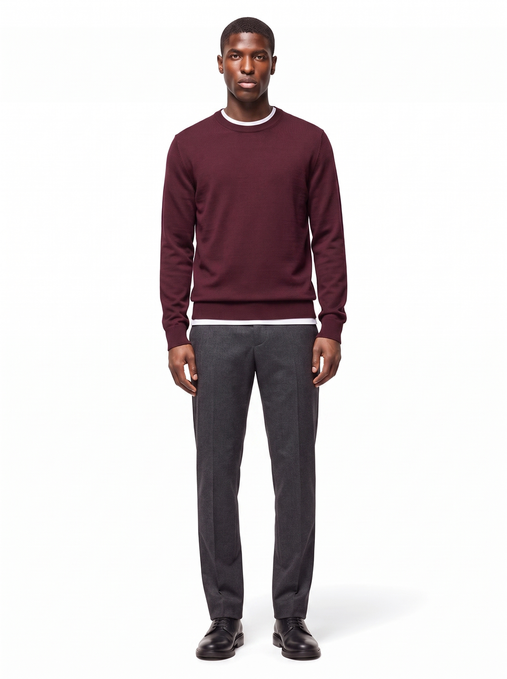 Deep burgundy crew neck sweater worn by model, front view