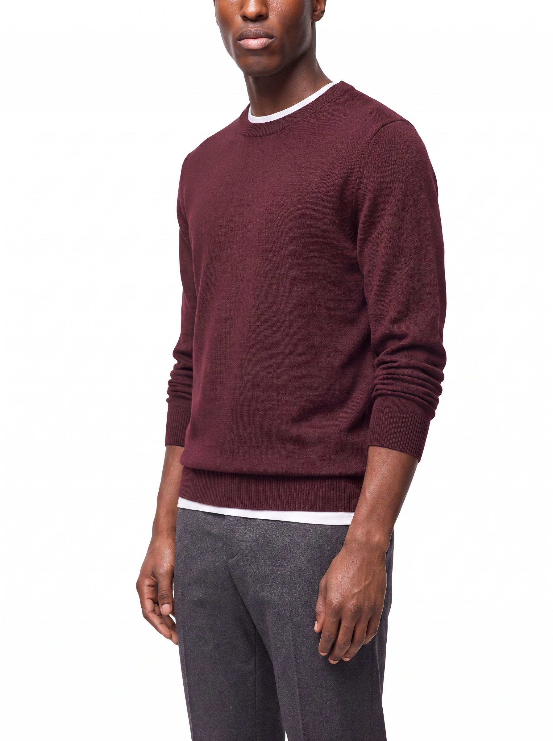 Three quarter view showing regular fit of burgundy sweater