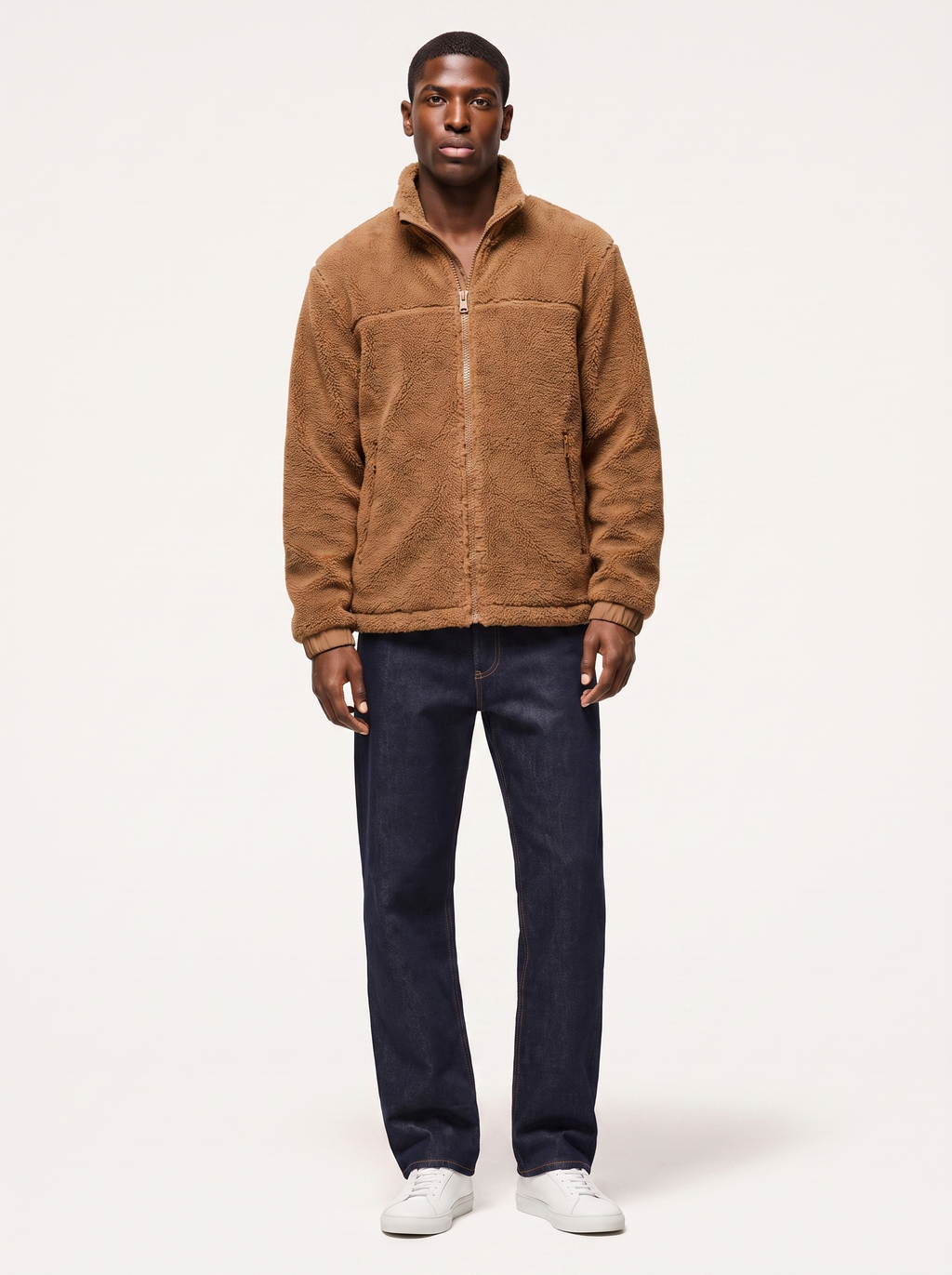 Camel brown sherpa fleece zip jacket worn by model, front view on white