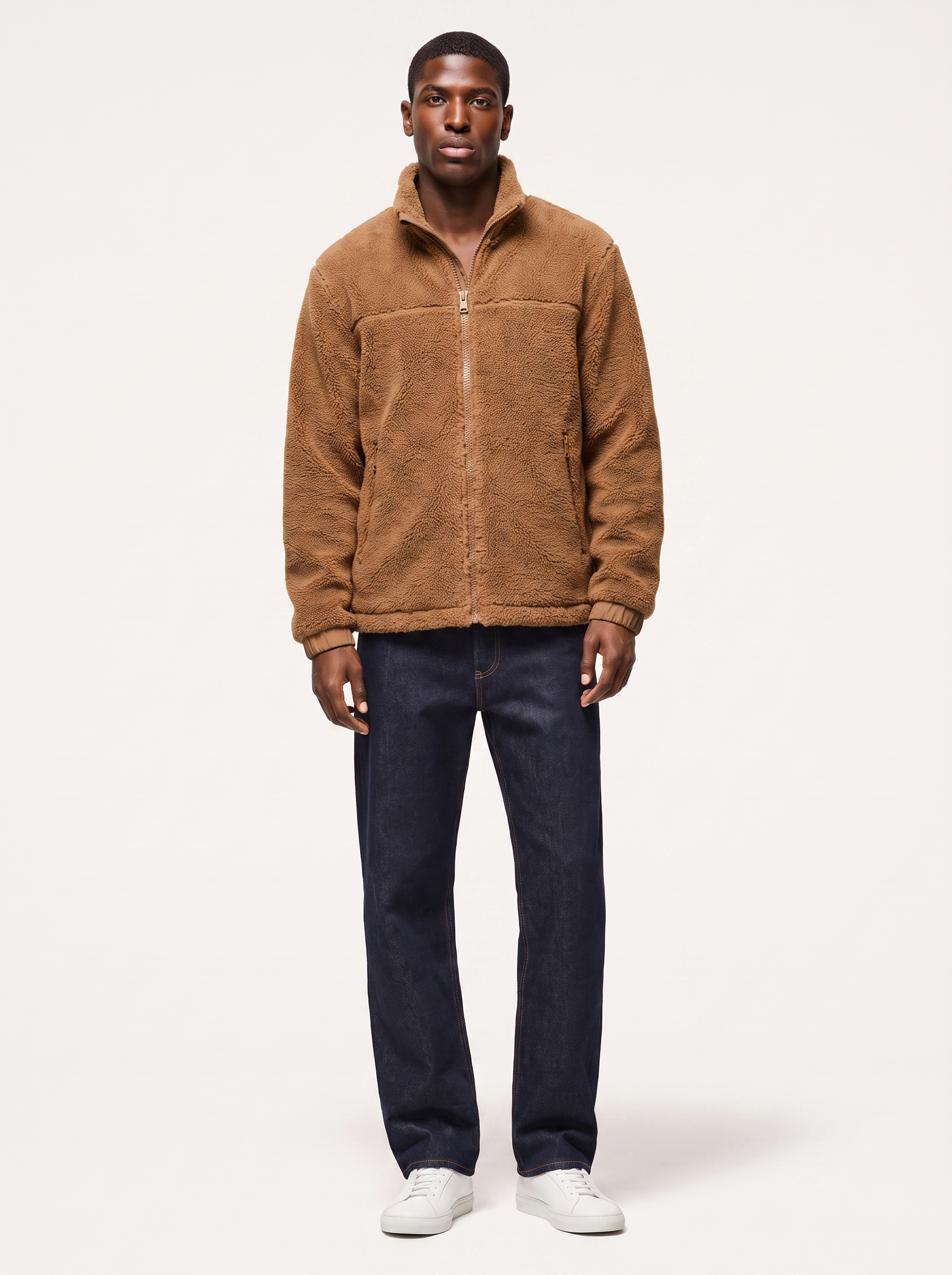 Camel brown sherpa fleece zip jacket worn by model, front view on white