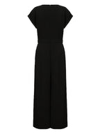 Cap sleeve jumpsuit styled for work and occasion wear