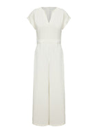 Cap sleeve jumpsuit styled for an evening occasion