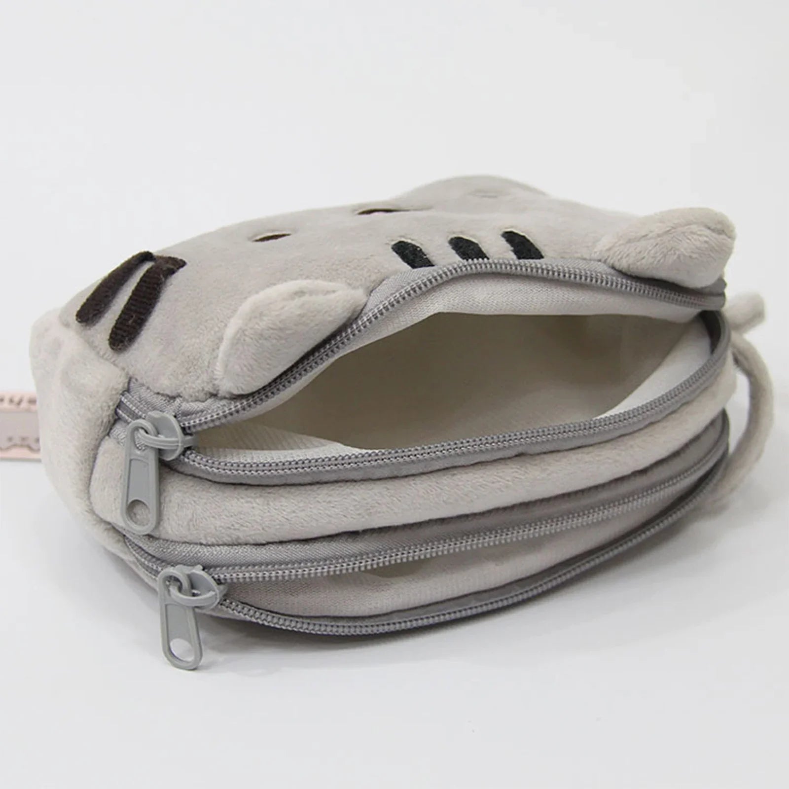 Cat plush pencil case zipper detail