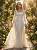 White long sleeve square neck chiffon maxi dress worn in a rose garden