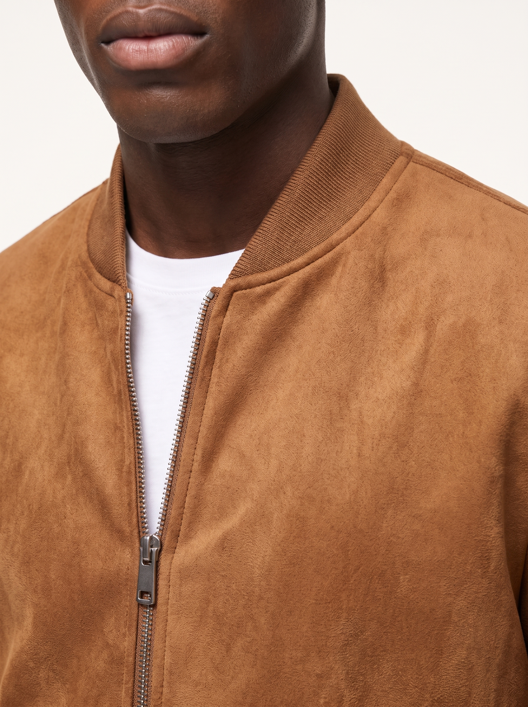 Ribbed knit collar and zipper close-up detail