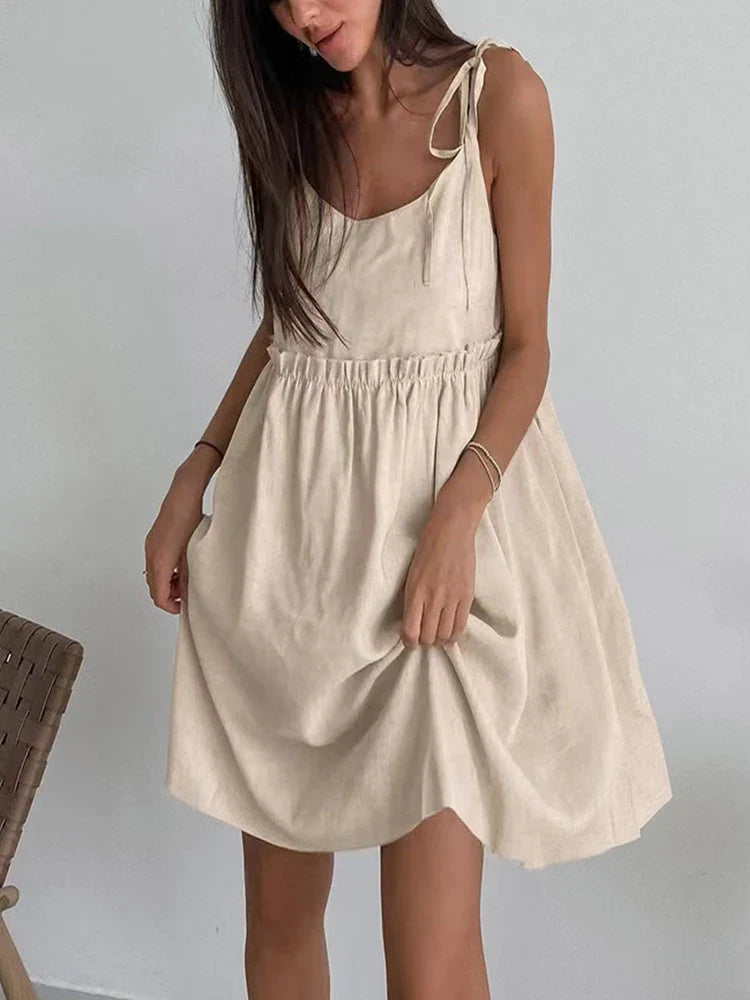 Cotton linen vest mini dress styled for warm weather