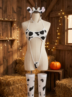 Cow print cosplay set on a dress form