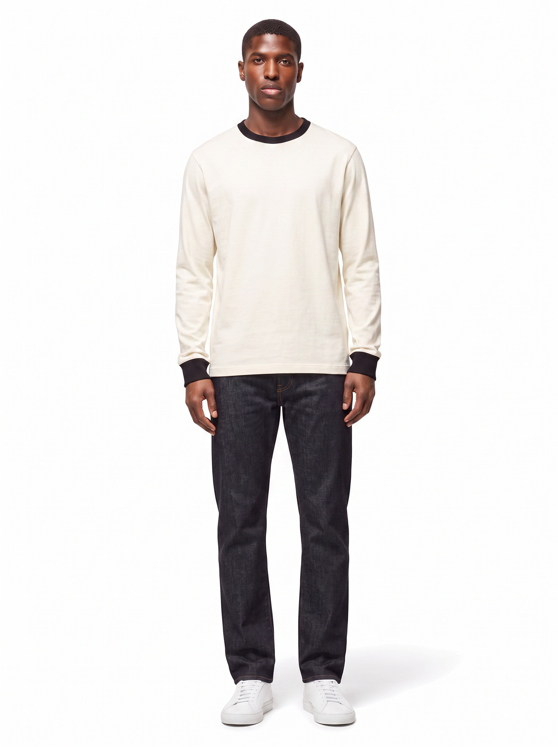 Cream long sleeve ringer tee worn by model, full body
