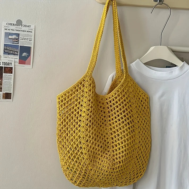 Crochet mesh tote bag showing open top