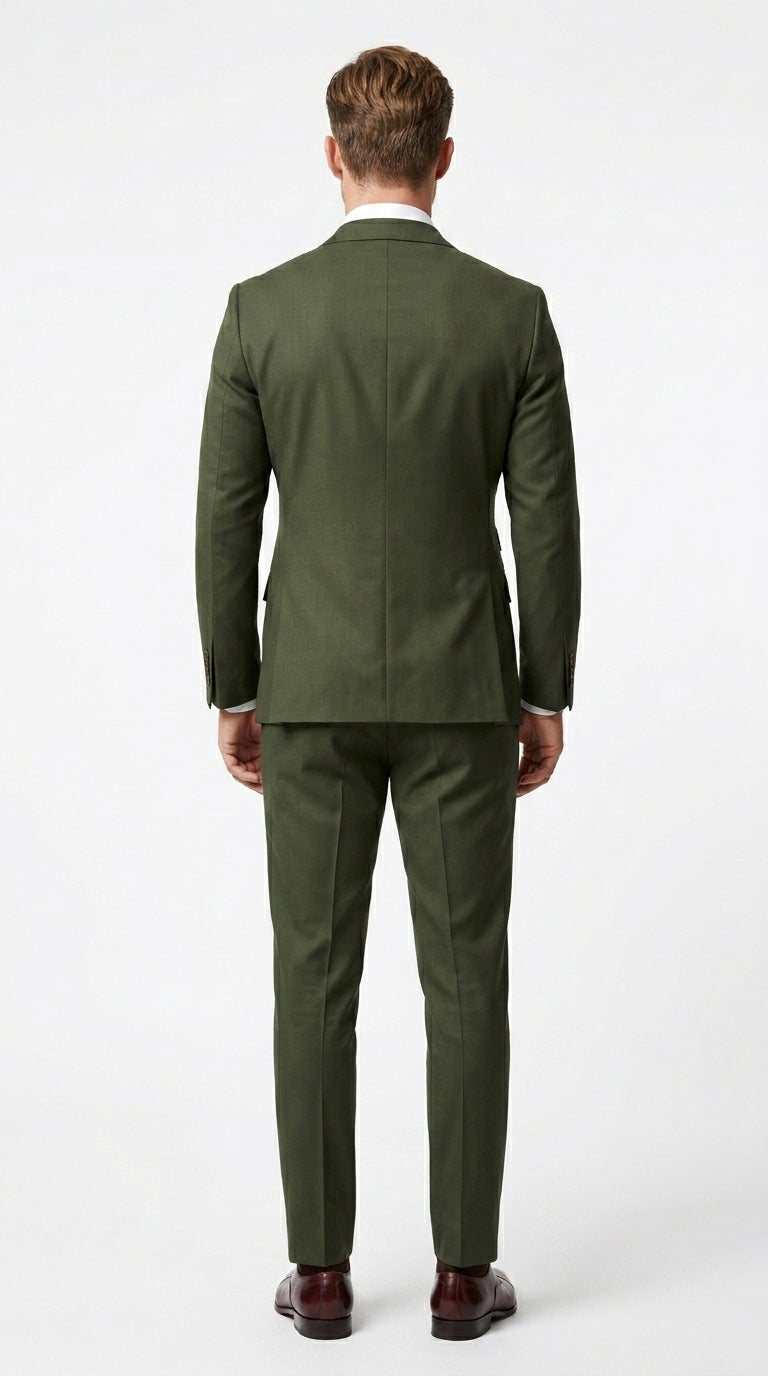 Side profile of dark green double breasted suit