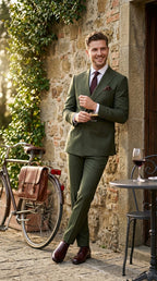 Dark green formal men's suit, full length view