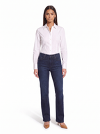 High waist dark indigo bootcut jeans worn by model, front view