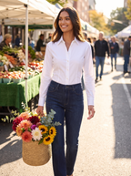 Dark bootcut jeans worn outdoors, lifestyle view