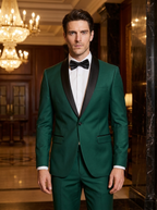 Man wearing the emerald green two-piece suit with black satin lapel at an evening venue