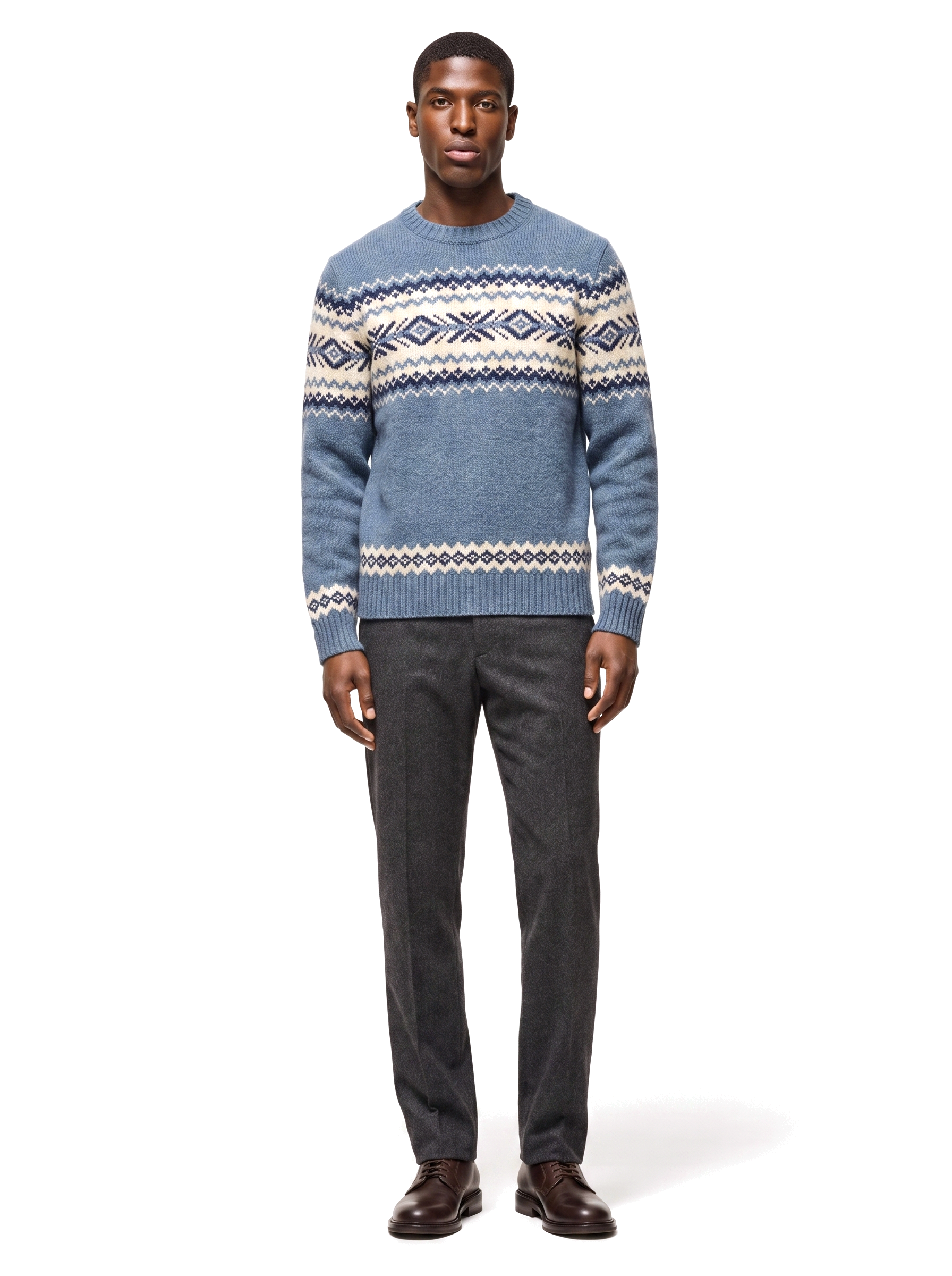 Fair Isle crew neck sweater in dusty blue worn by model, front view