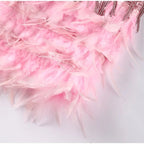 Full length view of the feather-trim mini dress