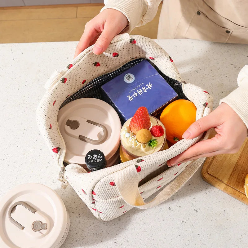 Lunch bag shown open with the insulated lining visible