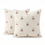 Two ivory throw pillow covers with ghosts hugging pumpkins