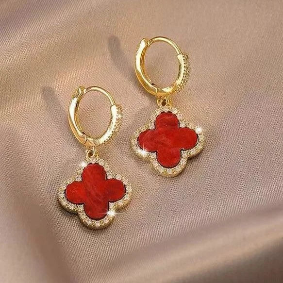 Gold-tone four-leaf clover earrings in red