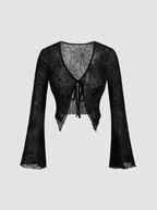 Gothic spider web V neck top on a white background