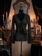 Gothic spider web V neck top on a dress form