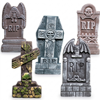 Five weathered foam RIP headstones shown with their metal ground stakes