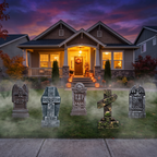 Halloween tombstones set up across a suburban front lawn