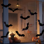 A swarm of hanging bats above a decorated Halloween entryway