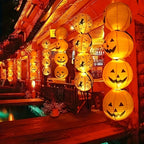 Two 8 inch paper Halloween pumpkin jack o lantern lanterns