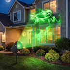 Projector staked in a front yard casting ghost patterns onto a house