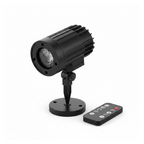Halloween rotating witch projector light on a white background