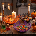 Spider web bowls filled with candy on a Halloween party table