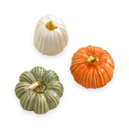 Handcrafted ceramic pumpkin decoration on a white background